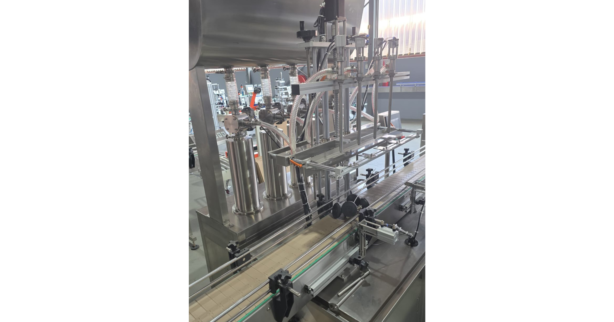 Fully Automatic Bottle Filling Machine | Rhino-pak - 1